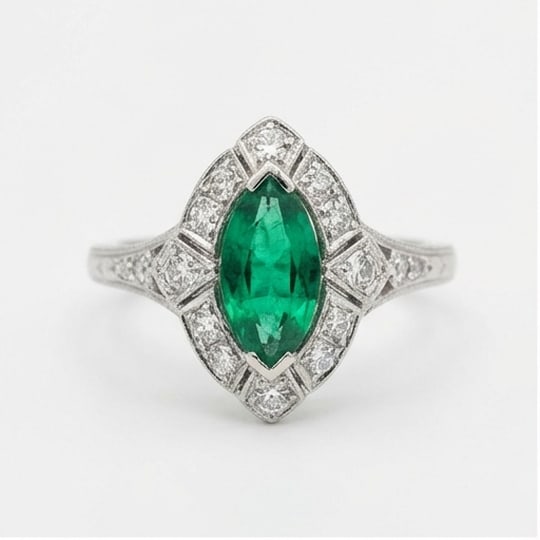 5.00 CT Emerald Lab-Grown Ring in White Gold: An exceptional 5.00 carat lab-grown emerald ring, expertly crafted in luxurious White Gold. The marquise cut with geometric art deco setting design highlights the brilliance of the lab-grown center