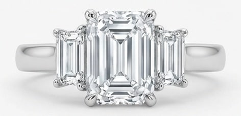 6.00 CT Lab Grown Diamond Lab-Grown Ring in White Gold: An exceptional 6.00 carat lab-grown lab grown diamond ring, expertly crafted in luxurious White Gold. The emerald cut center with matching emerald cut side stones design highlights the brilliance of t