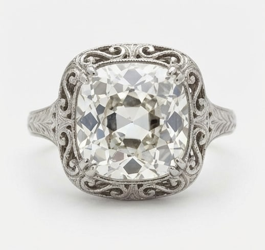 5.00 CT Lab Grown Diamond Lab-Grown Ring in White Gold: An exceptional 5.00 carat lab-grown lab grown diamond ring, expertly crafted in luxurious White Gold. The vintage cushion/old mine cut with intricate filigree and corner accents design highlights the