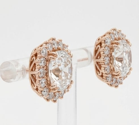 4.00 CT Lab Grown Diamond Lab-Grown Earring in Rose Gold: An exceptional 4.00 carat lab-grown lab grown diamond earring, expertly crafted in luxurious Rose Gold. The cushion cut studs with vintage scrollwork basket and halo design highlights the brilliance o