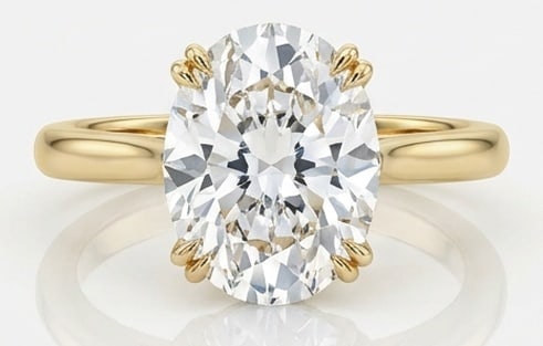 10.00 CT Lab Grown Diamond Lab-Grown Ring in Yellow Gold: An exceptional 10.00 carat lab-grown lab grown diamond ring, expertly crafted in luxurious Yellow Gold. The oval cut solitaire in a modern half-bezel/tube setting design highlights the brilliance of t