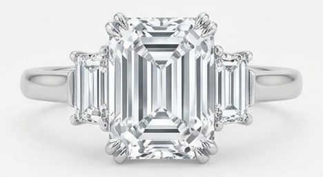 6.00 CT Lab Grown Diamond Lab-Grown Ring in White Gold: An exceptional 6.00 carat lab-grown lab grown diamond ring, expertly crafted in luxurious White Gold. The emerald cut with baguette side stones (classic three-stone) design highlights the brilliance o