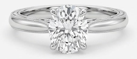 3.00 CT Lab Grown Diamond Lab-Grown Ring in White Gold: An exceptional 3.00 carat lab-grown lab grown diamond ring, expertly crafted in luxurious White Gold. The oval cut solitaire with vintage engraved shoulders design highlights the brilliance of the lab