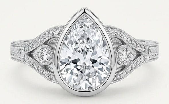 6.00 CT Lab Grown Diamond Lab-Grown Ring in White Gold: An exceptional 6.00 carat lab-grown lab grown diamond ring, expertly crafted in luxurious White Gold. The pear cut bezel set with vintage scrollwork and accents design highlights the brilliance of the