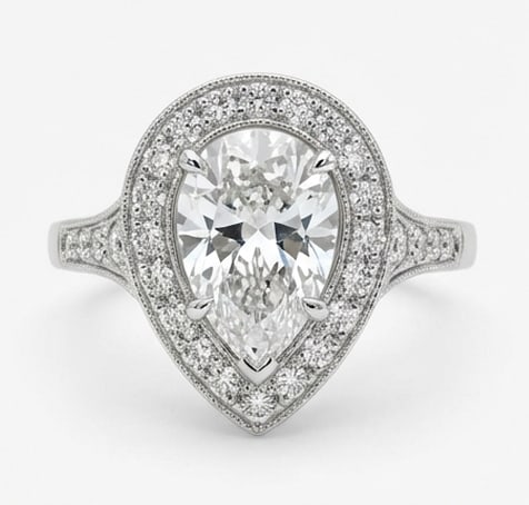 4.00 CT Lab grown diamond Lab-Grown Ring in White Gold: An exceptional 4.00 carat lab-grown lab grown diamond ring, expertly crafted in luxurious White Gold. The pear cut split-shank halo design highlights the brilliance of the lab-grown center stone,