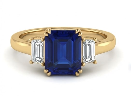10.00 CT Sapphire Lab-Grown Ring in Yellow gold: An exceptional 10.00 carat lab-grown sapphire ring, expertly crafted in luxurious Yellow gold. The emerald cut three-stone design highlights the brilliance of the lab-grown center stone, accented with