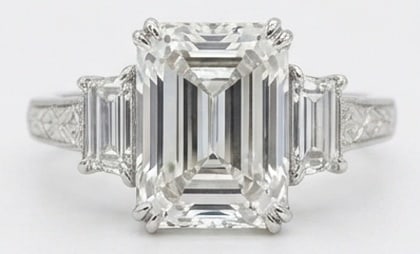 10.00 CT Lab grown diamond Lab-Grown Ring in White Gold: An exceptional 10.00 carat lab-grown lab grown diamond ring, expertly crafted in luxurious White Gold. The emerald cut three-stone with vintage details design highlights the brilliance of the