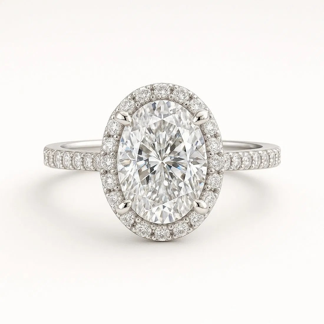 4.00 CT Lab grown diamond Lab-Grown Ring in White Gold: An exceptional 4.00 carat lab-grown lab grown diamond ring, expertly crafted in luxurious White Gold. The oval cut halo with pave band design highlights the brilliance of the lab-grown center stone, a