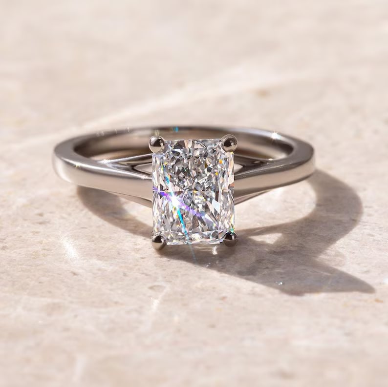 Luxury IGI Certified 1.80 Ct Radiant Cut Natural Diamond Ring in 14K White Gold: Exceptional luxury ring showcasing approximately 1.80 carat natural diamond, beautifully crafted in 14K White Gold. This sophisticated engagement ring features a striking radiant-cut center natural di