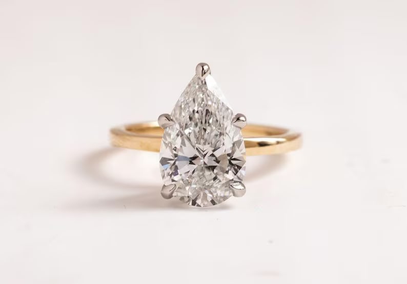 Luxury GIA Certified 1.90 Ct Pear Cut Natural Diamond Ring in 14K Yellow Gold (White/Platinum: Exquisite luxury engagement ring showcasing an approximately 1.90 carat natural diamond in a refined pear cut. Beautifully crafted in premium 14K Yellow Gold, this elegant ring features a classic 5-pr