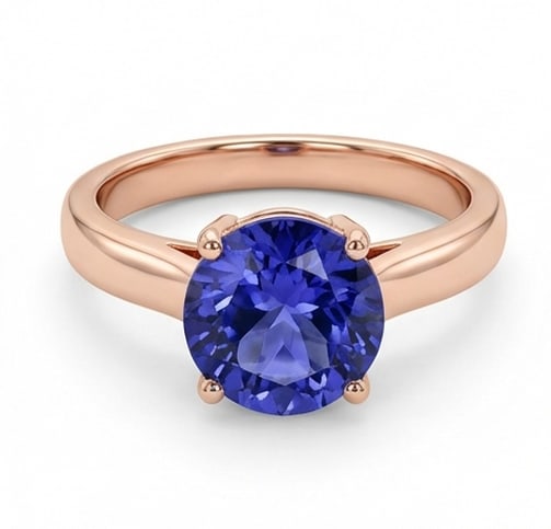 2.5 Ct Round Natural Tanzanite 14K Rose Gold Solitaire Setting Ring – Certified: This certified fine jewelry piece features a 2.5 carat natural Tanzanite in a Round cut, crafted in 14K Rose Gold. The Solitaire Setting design highlights the beauty of the natural center stone. All c