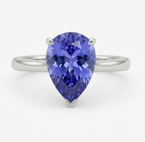 3.0 Ct Pear Natural Tanzanite 14K White Gold Solitaire with Split Gallery Ring – Certified: This certified fine jewelry piece features a 3.0 carat natural Tanzanite in a Pear cut, crafted in 14K White Gold. The Solitaire with Split Gallery design highlights the beauty of the natural center s