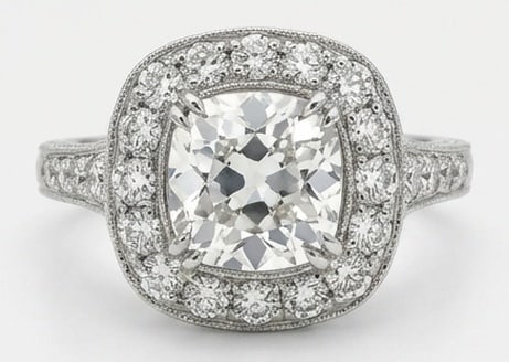 IGI Lab Grown 3.00 Ct Cushion (Old Mine Look) Diamond Ring – Vintage Cushion Halo – / in 14K: A timeless statement, this ring highlights a 3.00 carat IGI Certificate lab grown Cushion (Old Mine Look) center diamond Color E-F Clarity VVS1-VS1 Side stone lab grown as the focal point. The vintage