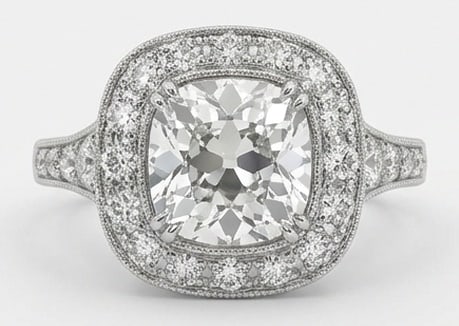 IGI Lab Grown 4.00 Ct Cushion (Old Mine Look) Diamond Ring – Vintage Halo with Tapered Shank – /: IGI Certified Lab Grown Diamond Center Stone Color E-F Clarity VVS1-VS1 Side Stone Lab Grown Sophisticated and modern, this ring is defined by a 4.00 carat lab grown Cushion (Old Mine Look) center dia