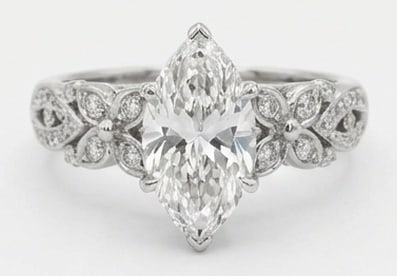 IGI Lab Grown 3.00 Ct Marquise Diamond Ring – Floral Inspired Halo with Marquise Center – / in: IGI Certified Lab Grown Diamond Center Stone Color E-F Clarity VVS1-VS1 Side Stone Lab Grown DiamondDistinctive in silhouette, this ring centers on a 3.00 carat lab grown Marquise center diamond as th
