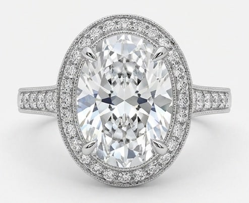 IGI Lab Grown 4.00 Ct Oval Diamond Ring – Classic Oval Halo with Milgrain Edges – / in 14K White: IGI Certified Lab Grown Diamond Center Stone Color E-F Clarity VVS1-VS1 Side Stone Lab Grown Diamond Graceful and eye-catching, this ring is set with a 4.00 carat lab grown Oval center diamond. White