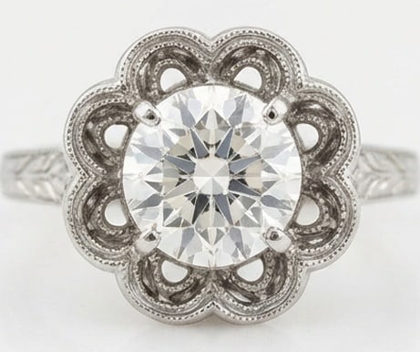 IGI Lab Grown 4.00 Ct Round Brilliant Diamond Ring – Art Deco Floral / Scalloped Halo – / in 14K: IGI Certified Lab Grown Diamond Center Stone Color E-F Clarity VVS1-VS1 Classic with a contemporary edge, this ring spotlights a 4.00 carat lab grown Round Brilliant center diamond. Set in White Gold