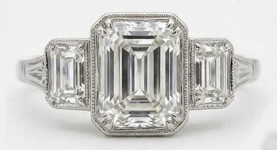 IGI Lab Grown 5.00 Ct Emerald Cut Diamond Ring – Art Deco Three-Stone Bezel Set (Step Cut) – /: IGI Certified Lab Grown Diamond Center Stone Color E-F Clarity VVS1-VS1 Side Stone Lab Grown Diamond Designed to stand out, this ring presents a 5.00 carat lab grown Emerald Cut center diamond. Set in
