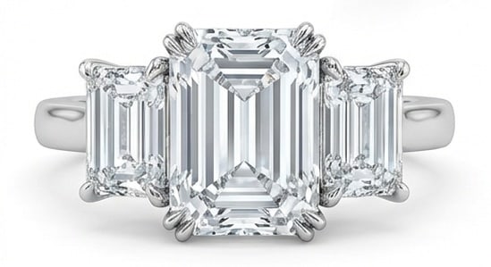 IGI Lab Grown 6.00 Ct Emerald Cut Diamond Ring – Massive Three-Stone Emerald Cut – / in 14K: IGI Certified Lab Grown Diamond Center Stone Color E-F Clarity VVS1-VS1 Side Stone Lab Grown Diamond Chic and distinctive, this ring showcases a 6.00 carat lab grown Emerald Cut center diamond. White