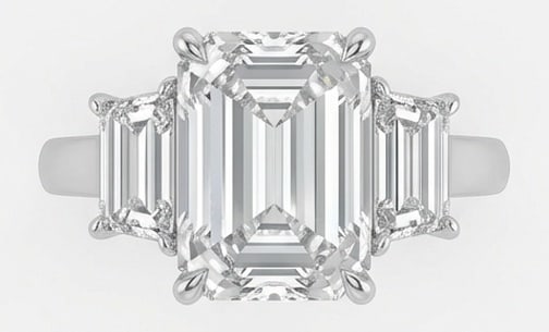 IGI Lab Grown 10.00 Ct Emerald Cut Diamond Ring – Classic Three-Stone Emerald Cut (Emerald Sides): IGI Certified Lab Grown Diamond Center Stone Color E-F Clarity VVS1-VS1 Side Stone Lab Grown Diamond A timeless statement, this ring highlights a 10.00 carat lab grown Emerald Cut center diamond. Feat