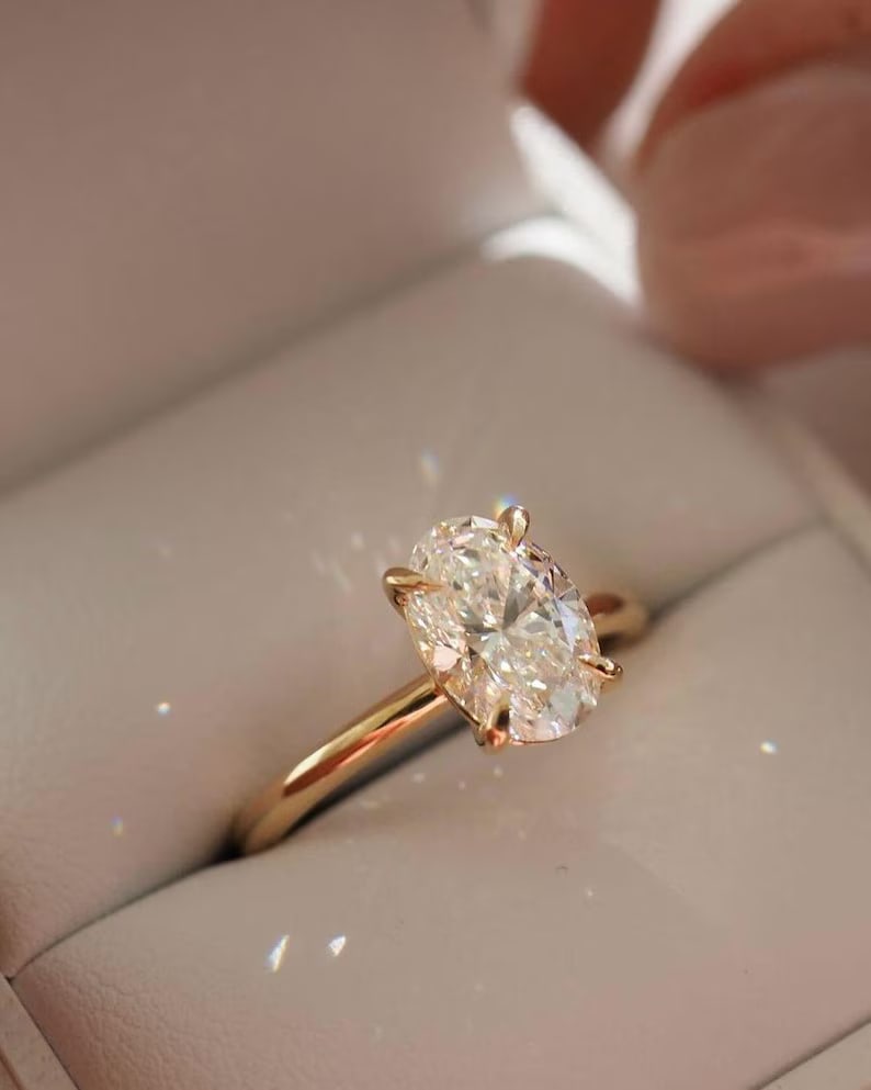 Luxury IGI Certified 2.25 Ct Oval Cut Lab Grown Diamond Ring in 14K Yellow Gold (1 of 4)