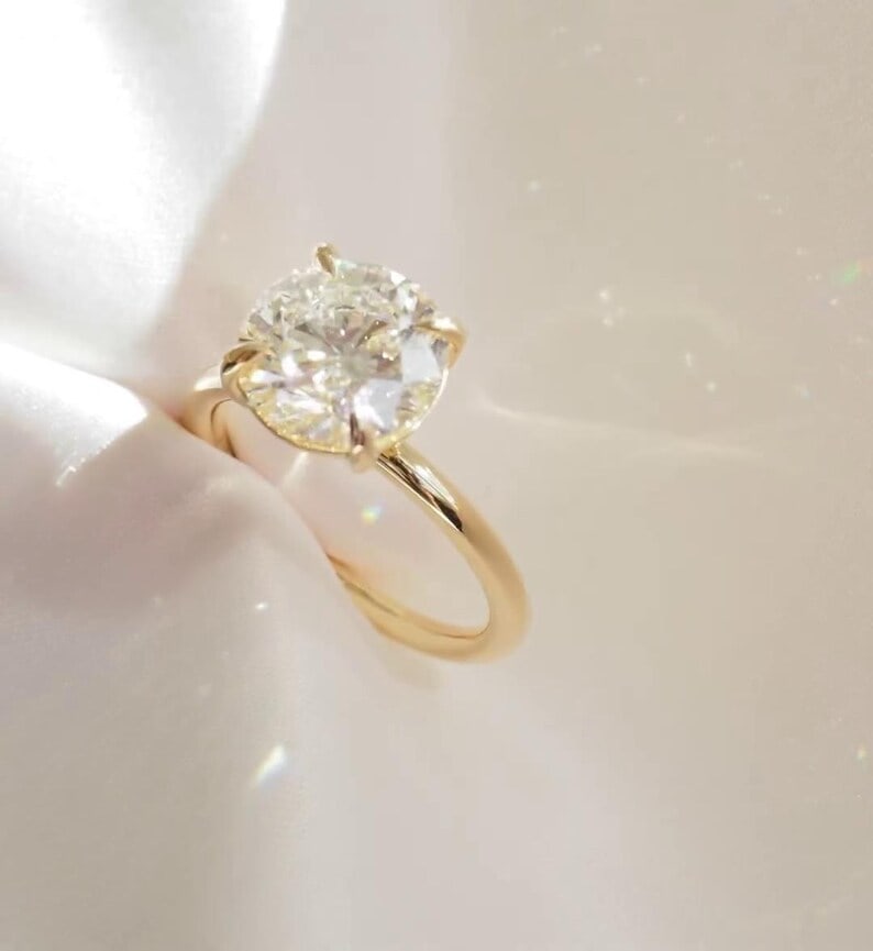 Luxury GIA Certified 1.80 Ct Round Brilliant Cut Lab Grown Diamond Ring in 14K Yellow Gold: An elegant and luxurious engagement ring featuring an approximately 1.80 carat lab grown diamond in a refined round brilliant cut cut. Beautifully crafted in premium 14K Yellow Gold, this ring showcas