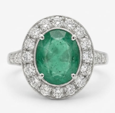 3.0 Ct Oval Natural Emerald 14K White Gold Halo Setting with Vintage Shank Ring Certified: This certified fine jewelry piece features a 3.0 carat natural Emerald in a Oval cut, crafted in 14K White Gold. The Halo Setting with Vintage Shank design highlights the beauty of the natural center 