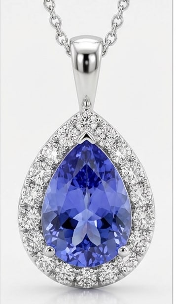 4.0 Ct Pear Natural Tanzanite 14K White Gold Pendant with Halo Certified: This certified fine jewelry piece features a 4.0 carat natural Tanzanite in a Pear cut, crafted in 14K White Gold. The Pendant with Halo design highlights the beauty of the natural center stone. It is