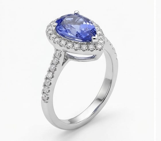 2.5 Ct Pear Natural Tanzanite 14K White Gold Halo Setting with Pave Shank Ring Certified: This certified fine jewelry piece features a 2.5 carat natural Tanzanite in a Pear cut, crafted in 14K White Gold. The Halo Setting with Pave Shank design highlights the beauty of the natural center s