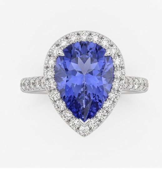 3.5 Ct Pear Natural Tanzanite 14K White Gold Halo Setting with Pave Shank Ring Certified: This certified fine jewelry piece features a 3.5 carat natural Tanzanite in a Pear cut, crafted in 14K White Gold. The Halo Setting with Pave Shank design highlights the beauty of the natural center s