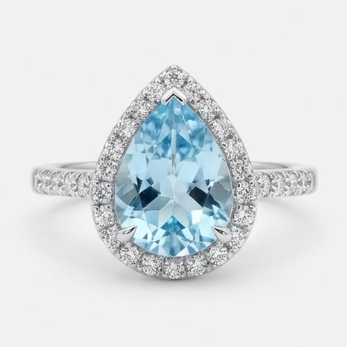 3.5 Ct Pear Natural Aquamarine 14K White Gold Halo Setting with Pave Shank Ring Certified: This certified fine jewelry piece features a 3.5 carat natural Aquamarine in a Pear cut, crafted in 14K White Gold. The Halo Setting with Pave Shank design highlights the beauty of the natural center 