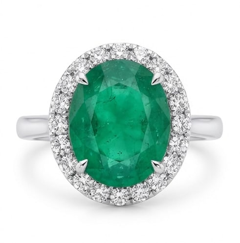 3.0 Ct Oval Natural Emerald 14K White Gold Halo Setting with Pave Shank Ring Certified: This certified fine jewelry piece features a 3.0 carat natural Emerald in a Oval cut, crafted in 14K White Gold. The Halo Setting with Pave Shank design highlights the beauty of the natural center sto