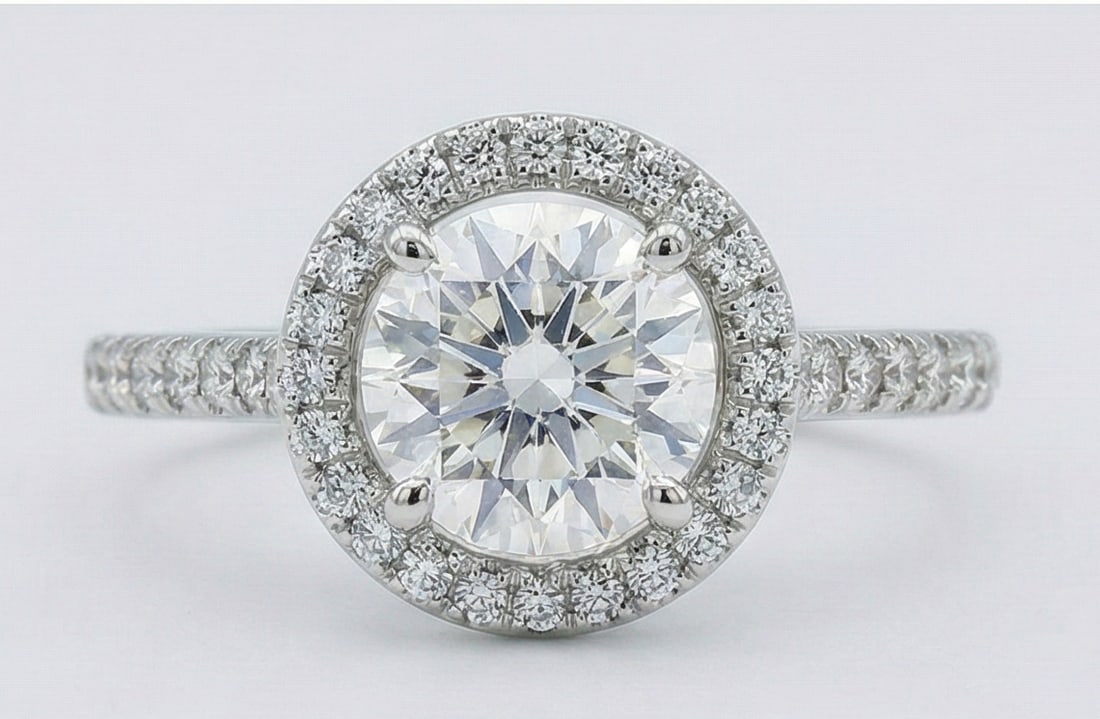 Luxury 4 Ct Round Cut Certified Lab Grown Diamond Halo Ring in 14K White Gold: A stunning 4 carat certified lab grown diamond engagement ring crafted in luxurious 14K white gold. This elegant halo design features a brilliant round cut center diamond surrounded by a sparkling hal
