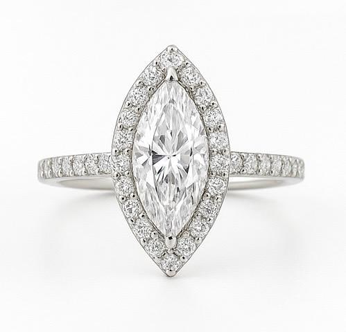 4.50 CT Lab Grown Marquise Cut Diamond Halo Ring in 14K White Gold: Elegant 4.50 carat lab grown marquise cut diamond centerpiece, surrounded by a halo of sparkling lab grown round diamonds. The pavé-set diamond band adds brilliance and sophistication, crafted in 14K