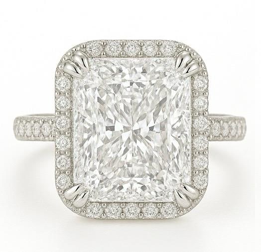 10 CT Lab Grown Radiant Cut Diamond Halo Ring with Pavé Band in 14K White Gold: Spectacular 10 carat lab grown radiant cut diamond centerpiece, framed with a halo of sparkling lab grown round diamonds. The pavé-set diamond band adds extra brilliance, all crafted in 14K white gol