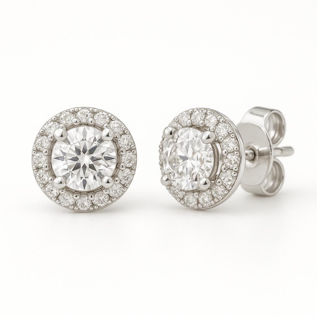 4 CT Lab Grown Round Brilliant Diamond Halo Stud Earrings in 14K White Gold: Elegant 4 carat total weight lab grown round brilliant cut diamond studs, encircled by a halo of lab grown round diamonds. Set in 14K white gold with secure push-back closures, offering sparkle and ti