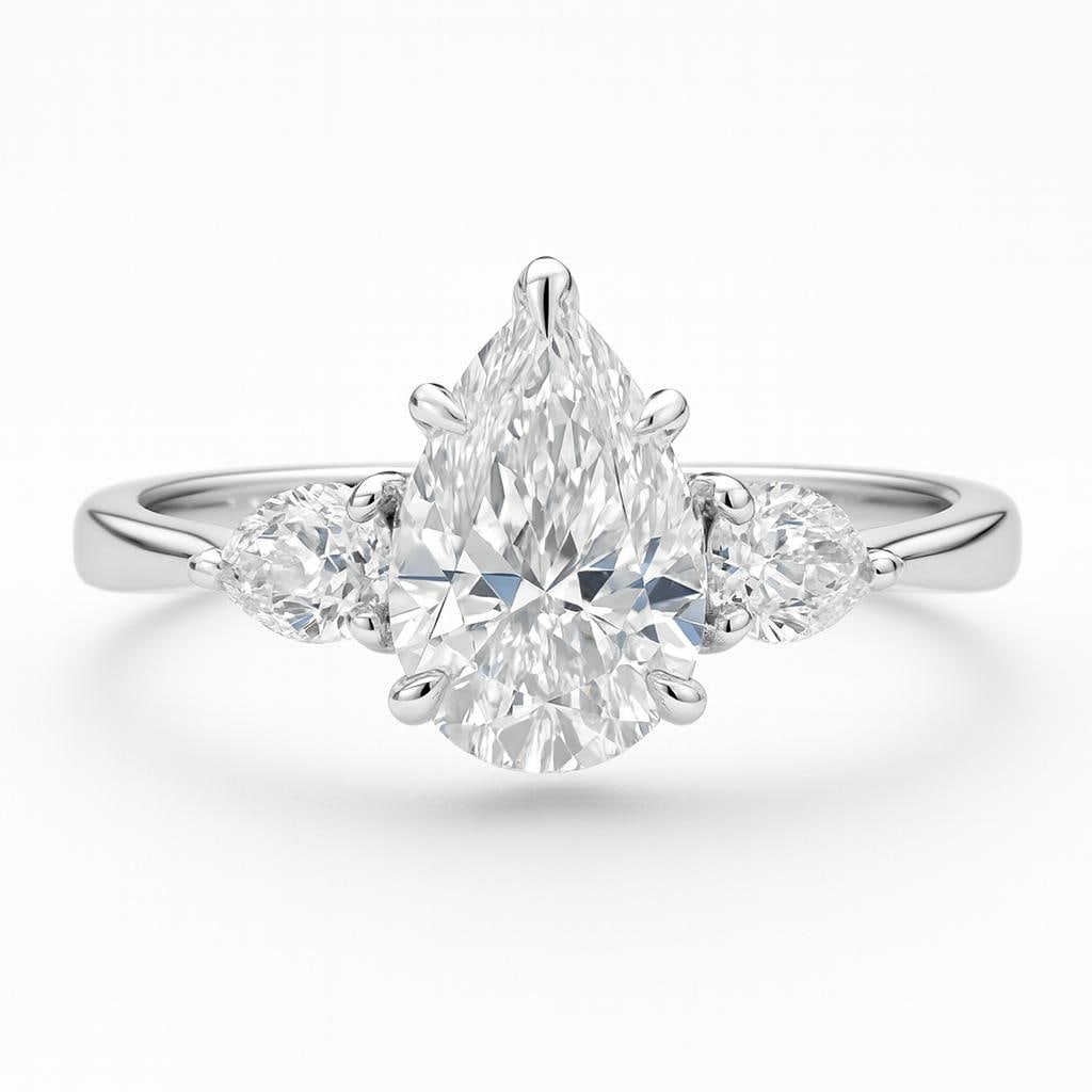 4 CT Lab Grown Pear Cut Diamond Ring with Half-Moon Side Stones in 14K White Gold: Charming 4 carat lab grown pear cut diamond centerpiece, flanked by a pair of half-moon cut lab grown side stones for a graceful three-stone look. Expertly crafted in 14K white gold with a polished fi