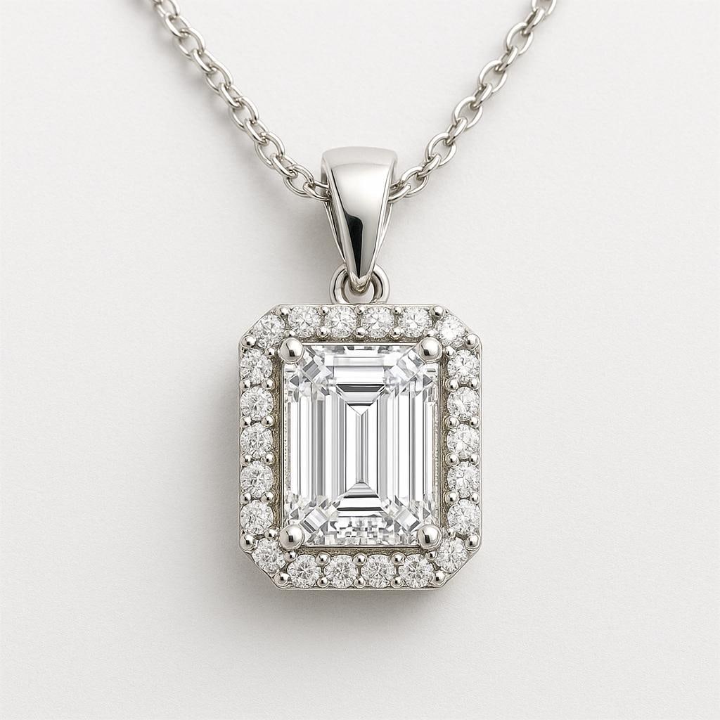 3.50 CT Lab Grown Emerald Cut Diamond Halo Pendant in 14K White Gold: Stunning 3.50 carat lab grown emerald cut diamond centerpiece, surrounded by a halo of sparkling lab grown round diamonds. Expertly set in 14K white gold with a polished finish, this pendant hangs gra