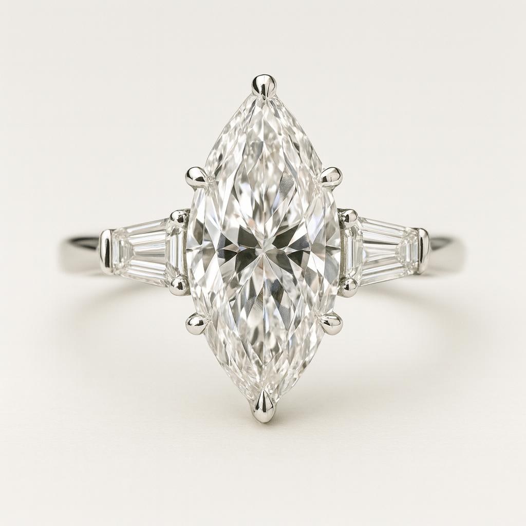 5 CT Lab Grown Marquise Cut Diamond Ring with Tapered Baguette Side Stones in 14K White Gold: Magnificent 5 carat lab grown marquise cut diamond centerpiece, flanked by tapered baguette cut side stones for a refined three-stone look. Expertly set in 14K white gold with a sleek polished finish,