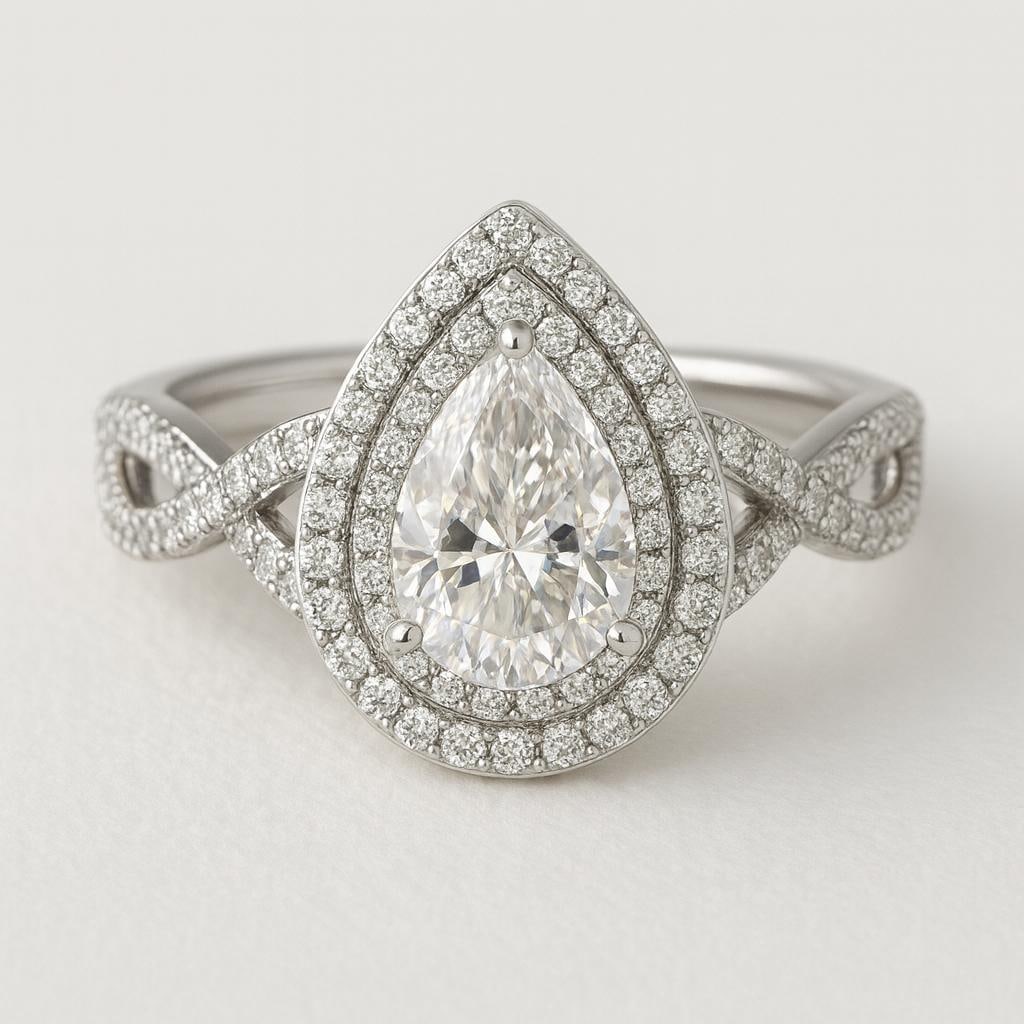 5.50 CT Lab Grown Pear Cut Diamond Double Halo Ring with Twisted Pavé Band in 14K White Gold: Exquisite 5.50 carat lab grown pear cut diamond centerpiece, framed by a double halo of sparkling lab grown round diamonds. The twisted pavé-set diamond band in 14K white gold adds intricate detailin