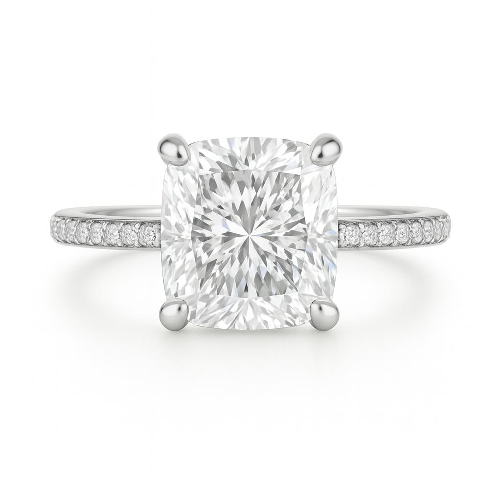 5.50 CT Lab Grown Cushion Cut Diamond Ring with Pavé Band in 14K White Gold: Classic 5.50 carat lab grown cushion cut diamond centerpiece, mounted on a pavé diamond band for added brilliance. Expertly crafted in 14K white gold with a sleek polished finish.Color Grade: E–FCl