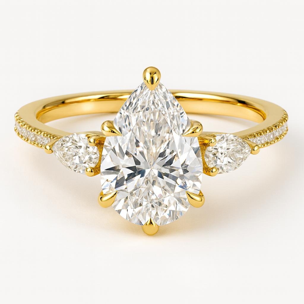 4.00 CT Lab Grown Pear Cut Diamond Ring with Side Stones in 14K Yellow Gold: Elegant 4.00 carat lab grown pear cut diamond centerpiece, accented with pear-shaped side stones on a delicate diamond-studded band. Crafted in 14K yellow gold with a polished finish, offering timeles
