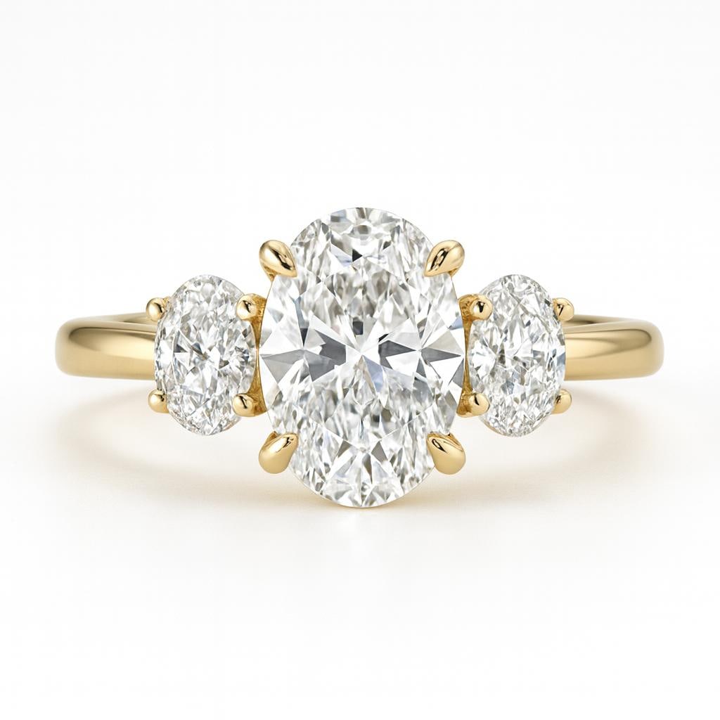 3.50 CT Lab Grown Oval Cut Diamond Three-Stone Ring in 14K Yellow Gold: Elegant 3.50 carat lab grown oval cut diamond centerpiece, flanked by two matching oval lab grown diamonds for a classic three-stone design. Crafted in 14K yellow gold with a high-polish finish, offer