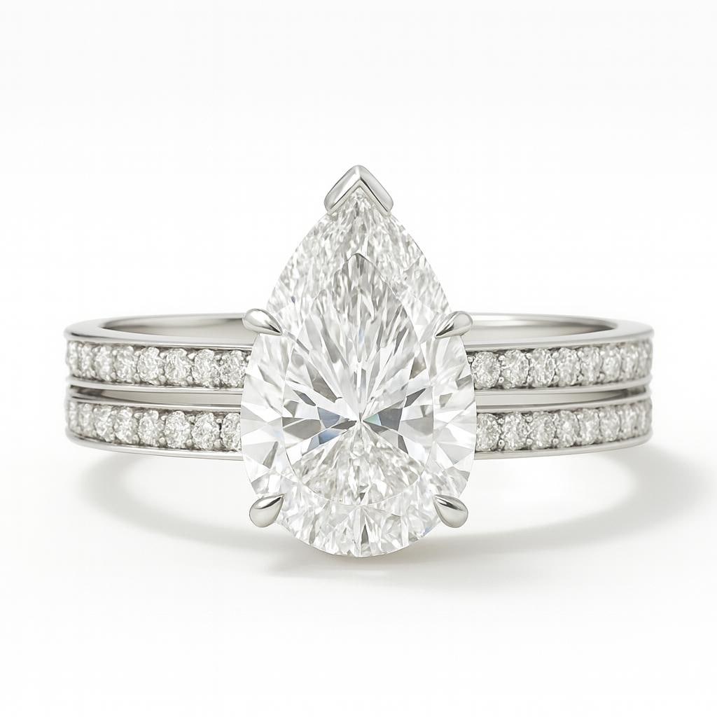 5.50 CT Lab Grown Pear Cut Diamond Bridal Set in 14K White Gold: Elegant 5.50 carat lab grown pear cut diamond centerpiece, paired with a matching pavé diamond band for a complete bridal set. Crafted in 14K white gold with a polished finish, this set symbolizes br