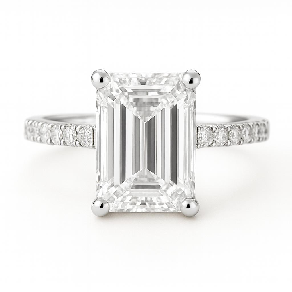 7.50 CT Lab Grown Emerald Cut Diamond Engagement Ring in 14K White Gold: Elegant 7.50 carat lab grown emerald cut diamond centerpiece, set in 14K white gold with a pavé diamond band. This ring showcases brilliance and symmetry with its step-cut facets, creating a timeless