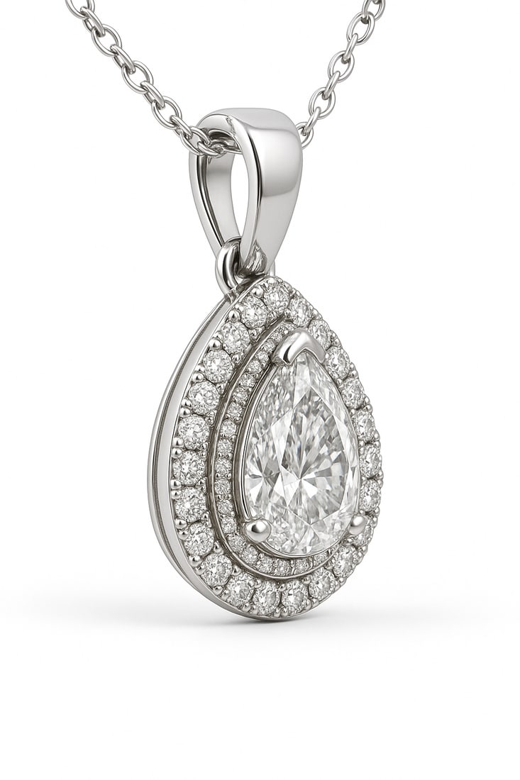 3.50 CT Lab Grown Pear Cut Diamond Double Halo Pendant in 14K White Gold (Chain Not Included): Elegant 3.50 carat lab grown pear cut diamond, encircled by a double halo of lab grown round brilliant diamonds. Set in polished 14K white gold, this pendant delivers a sparkling teardrop silhouette. 