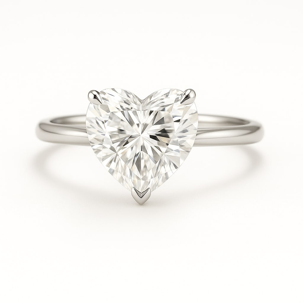5.00 CT Lab Grown Heart Cut Diamond Solitaire Ring in 14K White Gold: Romantic 5.00 carat lab grown heart cut diamond solitaire, prong set on a polished 14K white gold band. A timeless solitaire ring that symbolizes love and brilliance.Color Grade: D–FClarity: VVS1–