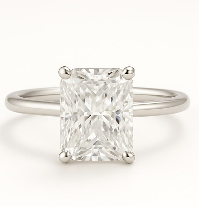 7.50 CT Lab Grown Radiant Cut Diamond Solitaire Ring in 14K White Gold: Magnificent 7.50 carat lab grown radiant cut diamond, prong set on a polished 14K white gold band. A bold solitaire engagement ring design that combines brilliance with modern sophistication.Color Gra