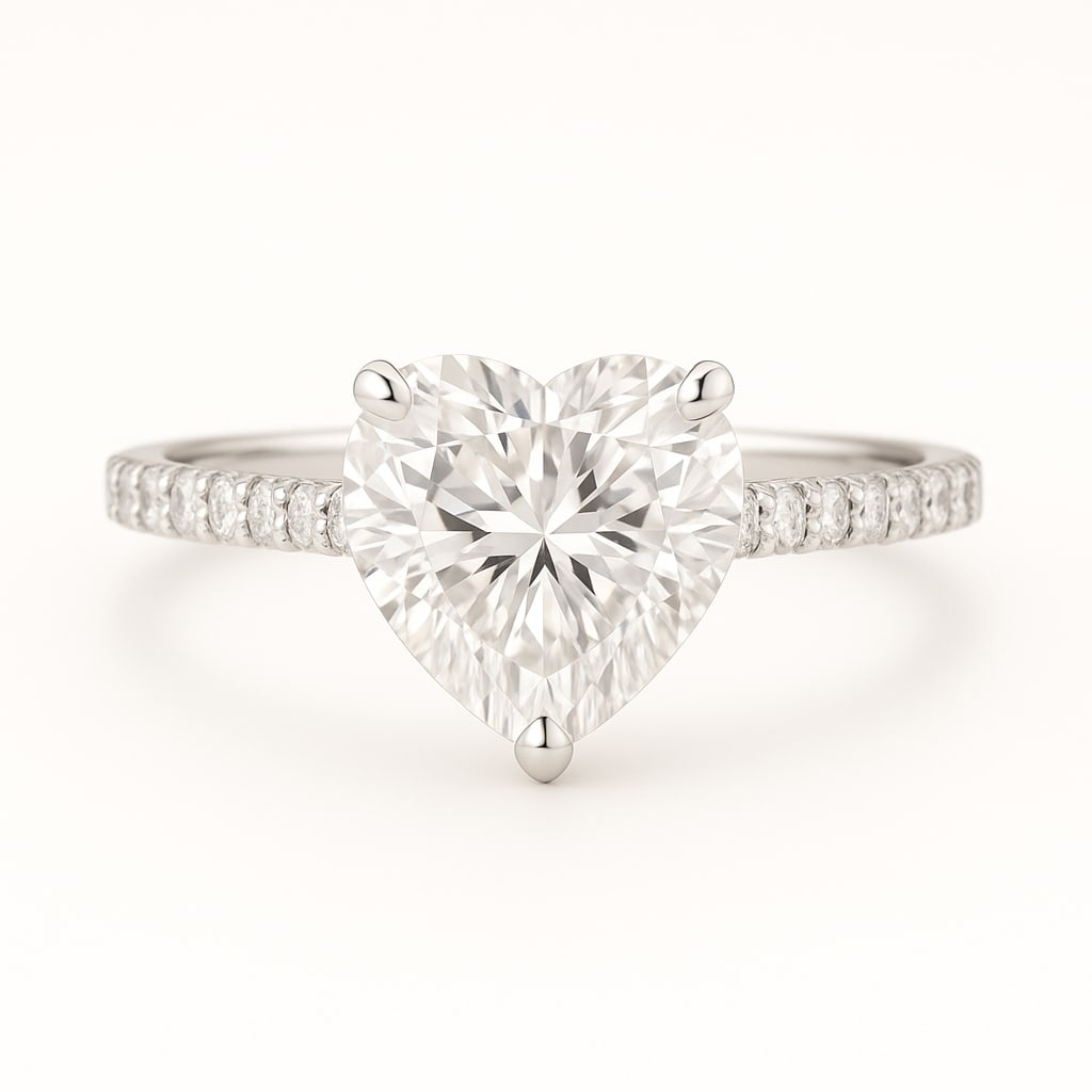 4.00 CT Lab Grown Heart Cut Diamond Solitaire Ring with Pavé Band in 14K White Gold: Beautiful 4.00 carat lab grown heart cut diamond, prong set on a polished 14K white gold pavé band. This romantic solitaire engagement ring symbolizes love and radiates timeless brilliance.Color Grad
