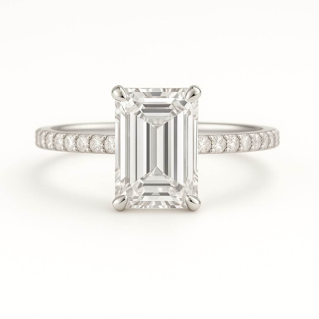 5.00 CT Lab Grown Emerald Cut Diamond Solitaire Ring with Pavé Band in 14K White Gold: Exquisite 5.00 carat lab grown emerald cut diamond, prong set on a polished 14K white gold band accented with pavé-set diamonds. A sophisticated engagement ring that highlights the clarity and brilli